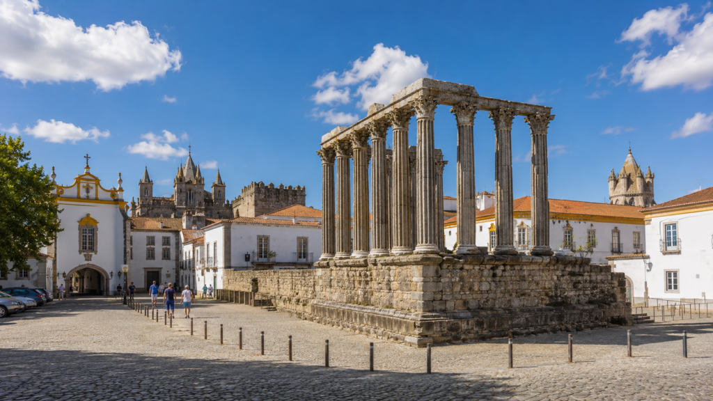 Roman Temple surrounded by historic architecture in Évora, Portugal
