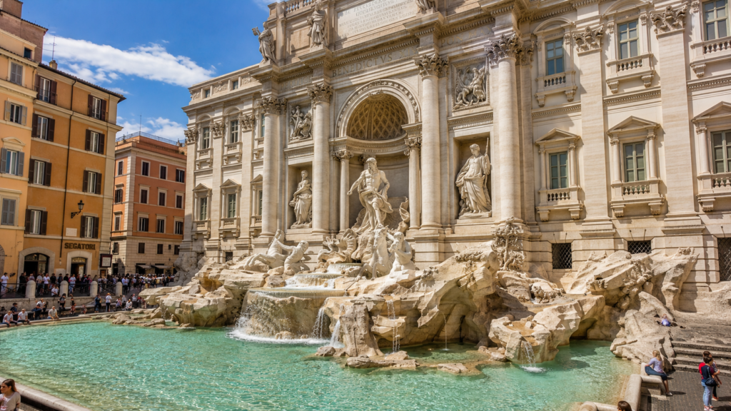 Trevi Fountain with Baroque sculptures and turquoise water in Rome, Italy