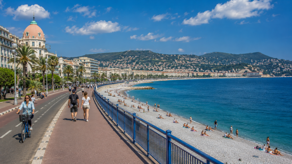 Promenade des Anglais and pebble beach along the Mediterranean coast in Nice, France
