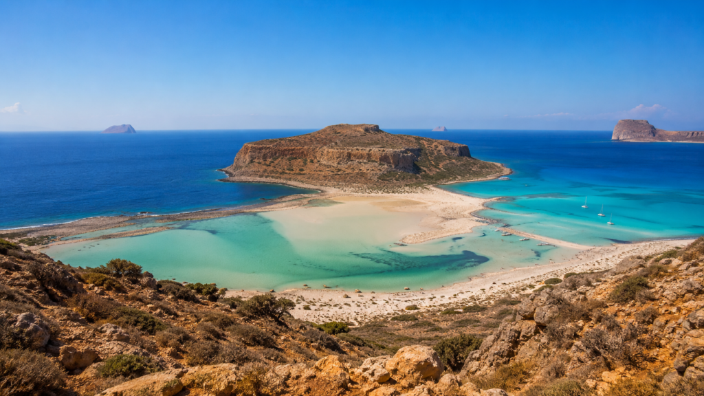 Turquoise waters and rugged coastline of Balos Lagoon in Crete, Greece
