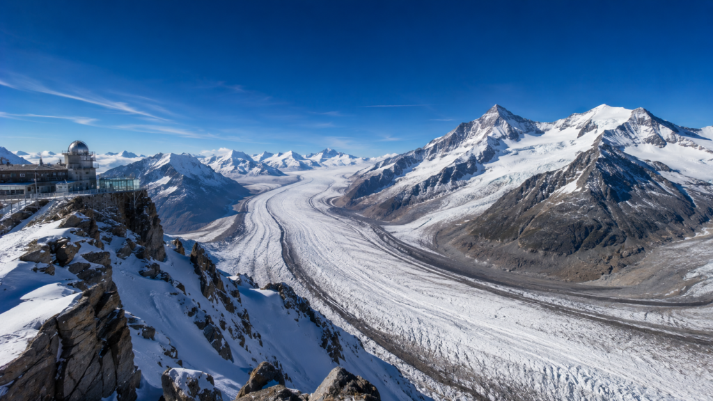 Snow-covered peaks and the Aletsch Glacier at Jungfraujoch, Switzerland
