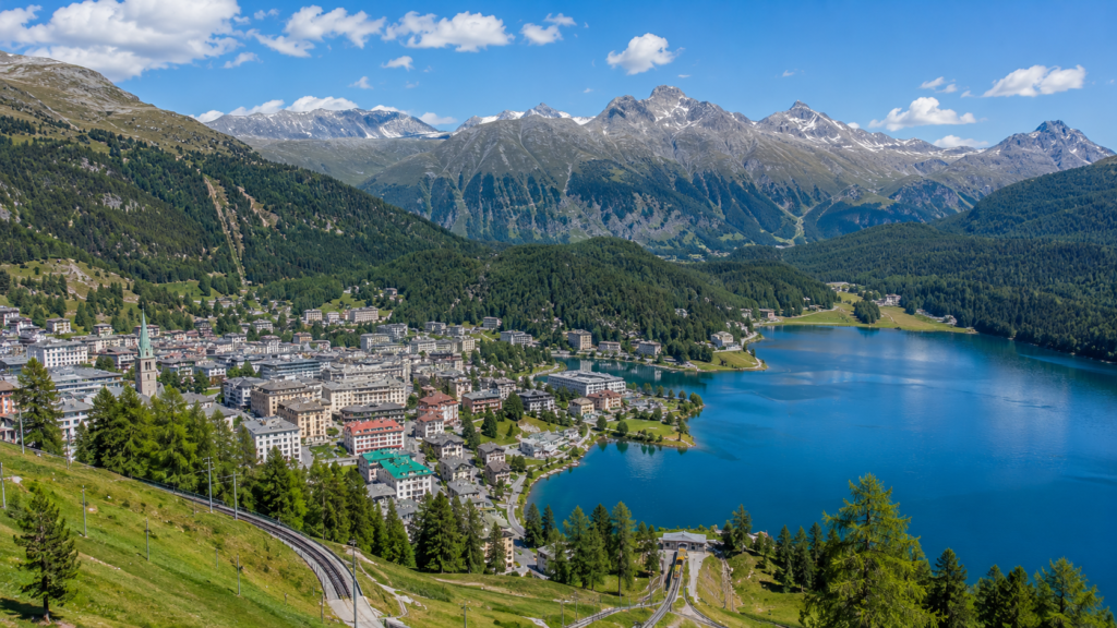 St. Moritz and its Alpine lake surrounded by the Engadin mountains