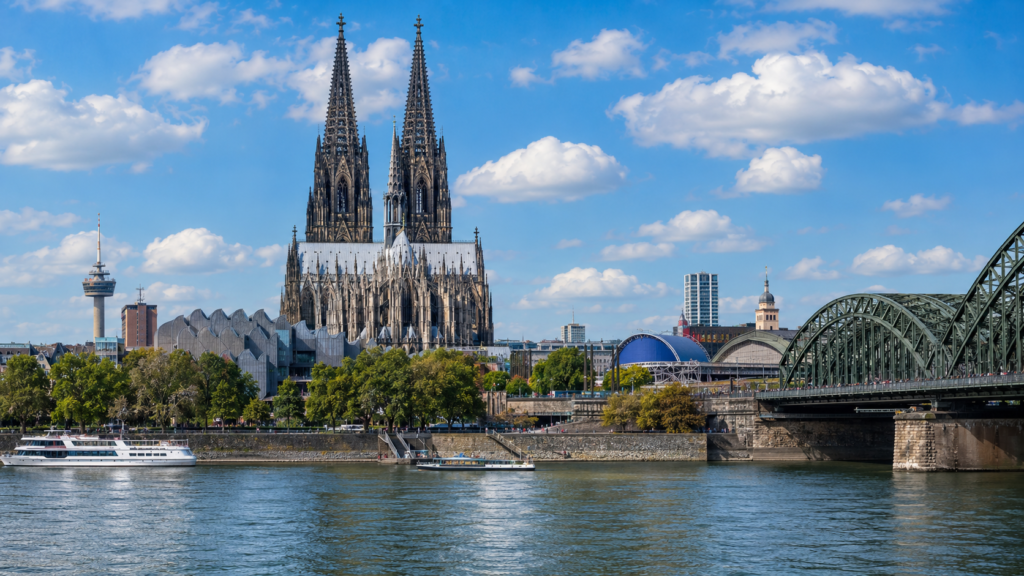 Cologne Cathedral rising above the Rhine River in Cologne, Germany