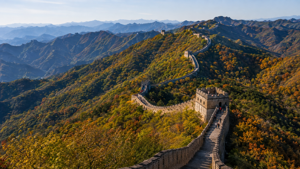 Great Wall of China winding across forested mountain ridges at Mutianyu